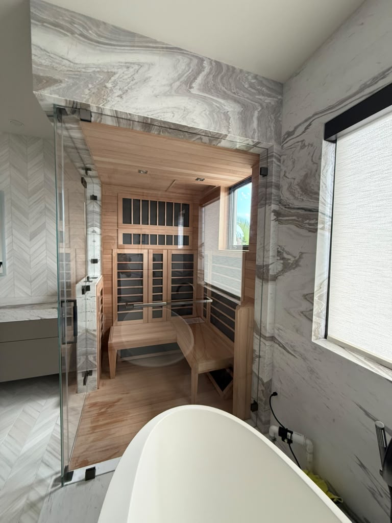 Completed sauna glass door and frameless bathroom enclosure